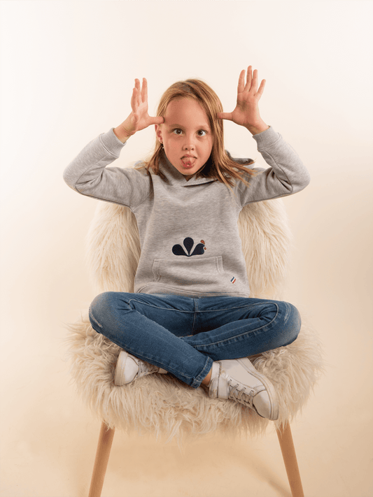 Le sweat à capuche mixte enfant - Confortablement Français